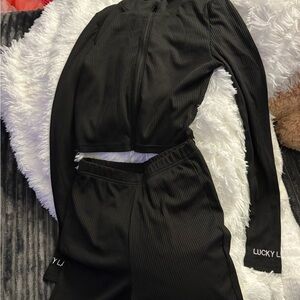 Woman’s Black Two Piece Set Lucky Label size Medium